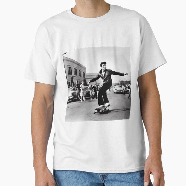 Elvis straight shredding on a skateboard